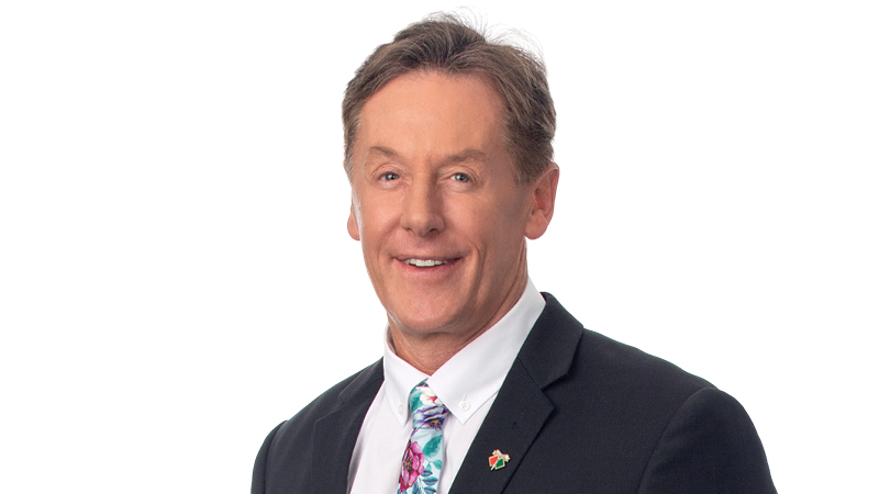 head shot of Mayor Darren Power in grey suit and colourful tie