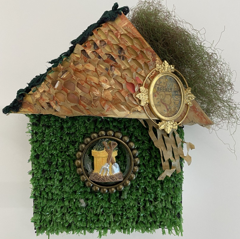 house made from recycled materials, plastic grass and natural fibres