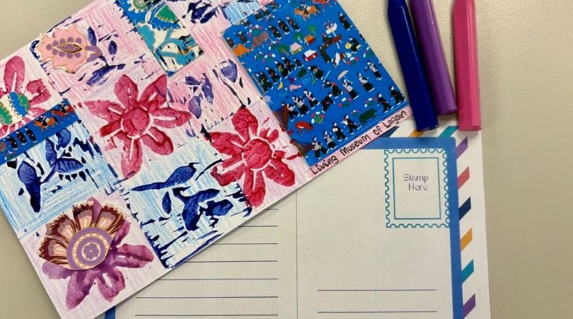 Pink, purple and blue mixed media postcard, with three crayons