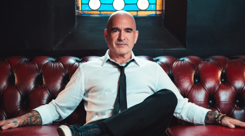 Musican Jack Jones reclines on an armchair